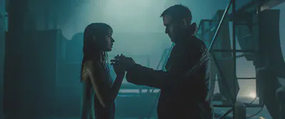 Joi and K in the rooftop scene: I feel so real you can touch me